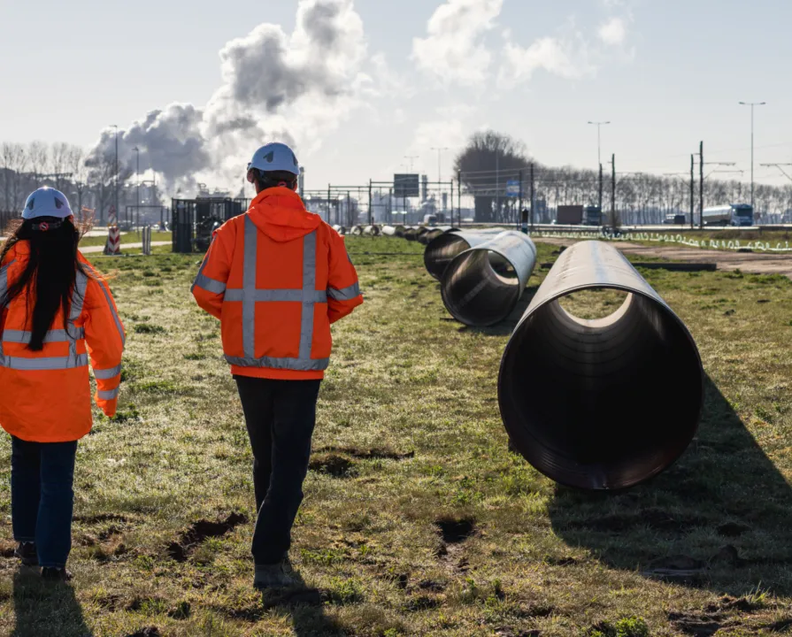 Pipeline operators at a field inspection.